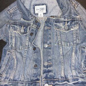 Children place denim jacket